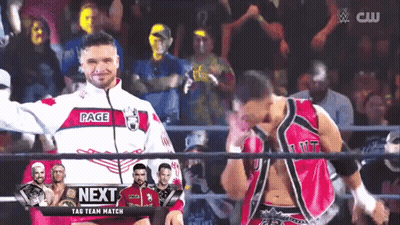 Two Men Wrestling Next Sign GIF