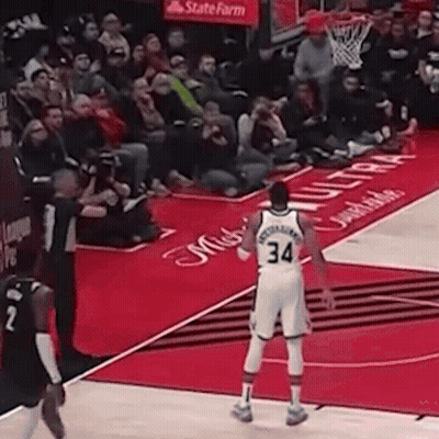 Two Men Wrestling On Mat GIF