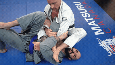 Two Men Wrestling On Matsuri Canada Mat GIF