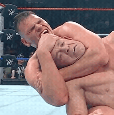 Two Men Wrestling One Holding Neck GIF