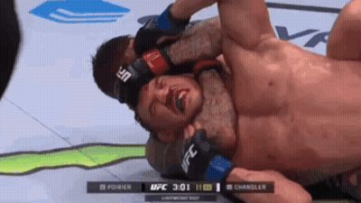 Two Men Wrestling One Wearing UFC Glove GIF