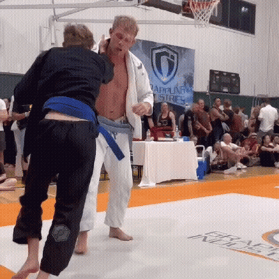 Two Men Wrestling Rappelling Tries Sign GIF