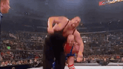 Two Men Wrestling With Axx Sign GIF
