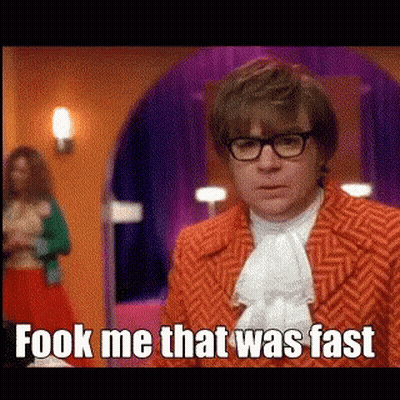 Two Men Wrestling With I Can't Come Back Sign GIF