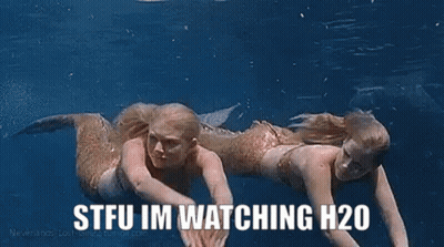 Two Mermaids Swimming Saying STFU Im Watching H20 GIF
