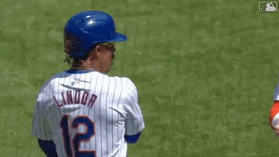 Two Mets Baseball Players Shake Hands On The Field GIF
