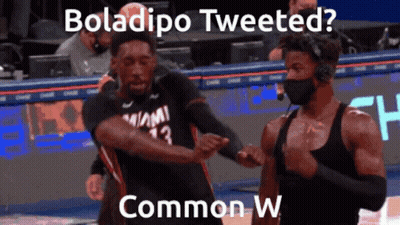 Two Miami Basketball Players Dancing in Face Masks