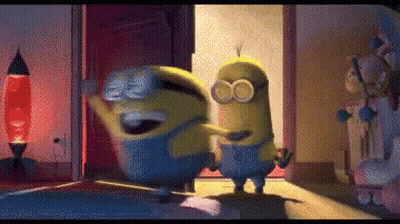 Two Minions Are Dancing In A Room In Front Of A Door . GIF