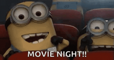 Two Minions Watching Movie In Theater GIF