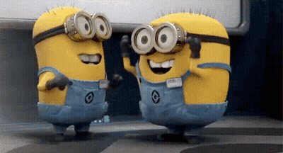 Two Minions Wearing Goggles And Overalls With Letter C GIF