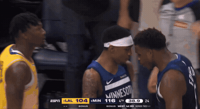 Two Minnesota Basketball Players Talking GIF