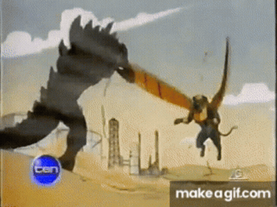 Two Monsters Fighting In Desert GIF