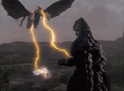 Two Monsters Fighting With Lightning Bolt GIF