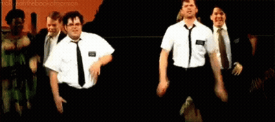 Two Mormons Standing Together GIF