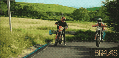 Two Motorcycle Riders On Road With Bravas GIF