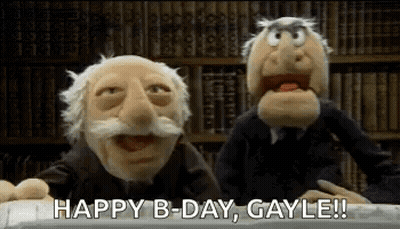 Two Muppets Are Sitting At A Table And Saying Happy B-Day Gayle ! GIF