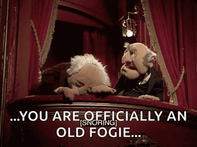 Two Muppets On A Balcony With The Words " You Are Officially An Old Fogie " Above Them GIF