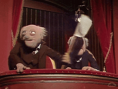 Two Muppets On Balcony With Red Curtain GIF