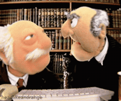 Two Muppets Talking Beside Bookshelf Headlikeanorange GIF