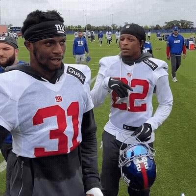 Two New York Giants Football Players Are Talking GIF