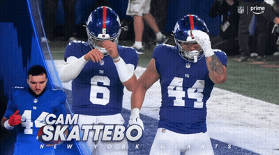 Two New York Giants Football Players GIF