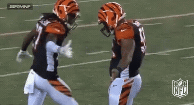 Two NFL Football Players Dancing On Field GIF