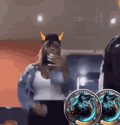 Two Niety Raven Coins Next To Woman In Viking Hat GIF