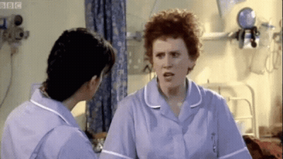 Two Nurses Talking In Hospital Room GIF