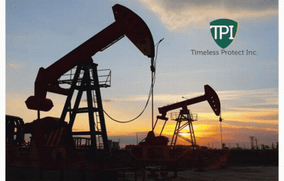 Two Oil Pumps Are Silhouetted Against A Sunset With A Timeless Protect Inc. Logo GIF