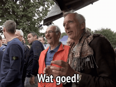 Two Older Men Orange Jacket Wat Goed GIF