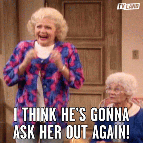 Two Older Women Are Standing In Front Of A Door And One Says " I Think He 'S Gonna Ask Her Out Again ! " GIF