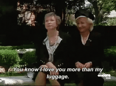 Two Older Women On Park Bench Saying You Know I Love You More Than My Luggage GIF