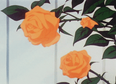 Two Orange Roses Are Hanging From A Tree Branch GIF