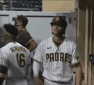 Two Padres Baseball Players In Dugout GIF