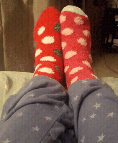Two Pairs Of Socks On Feet GIF