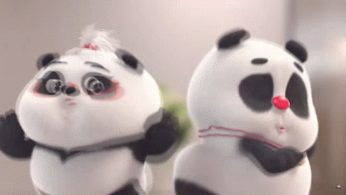 Two Panda Bears Are Standing Next To Each Other GIF