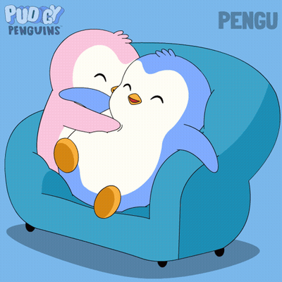 Two Penguins Hugging On Blue Couch GIF