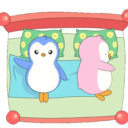 Two Penguins Laying On Bed With Pillows Sticker