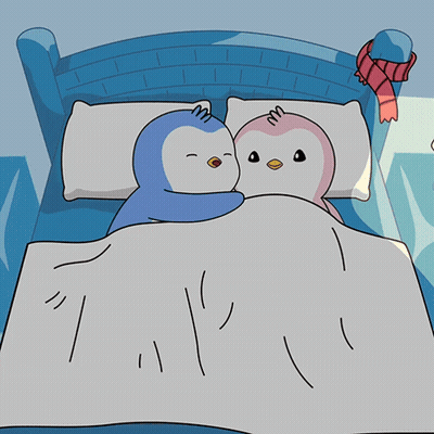 Two Penguins Sleeping In Bed GIF