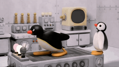 Two Penguins Standing Next To TV GIF
