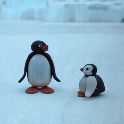 Two Penguins Standing On Snow GIF