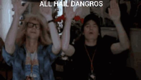Two People Are Raising Their Hands In The Air With The Words All Hail Dangros Written Above Them GIF