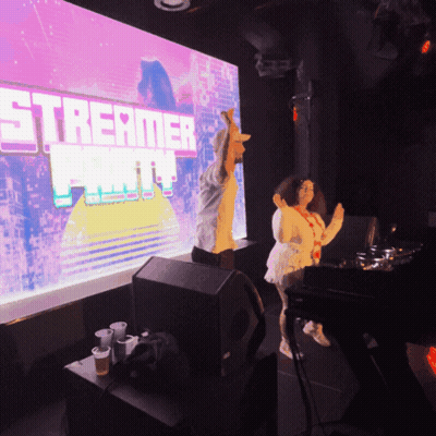 Two People Dancing At Party Screen GIF