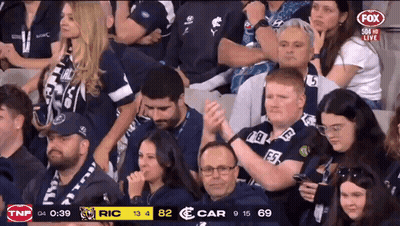 Two People Dancing In Front Of Disco Ball GIF