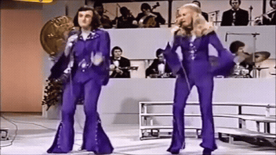 Two People Dancing In Purple Pants GIF