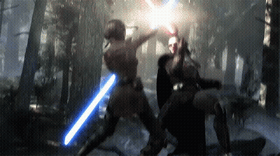 Two People Fighting With Lightsabers In A Forest GIF