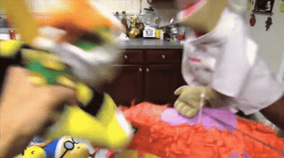 Two People Holding Stuffed Animals GIF