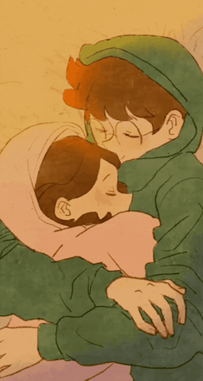 Two People Hugging One In Green Hoodie GIF