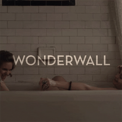 Two People In A Bathtub With The Word Wonderwall On The Bottom GIF