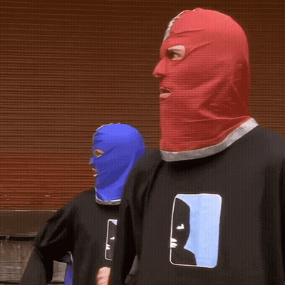 Two People In Balaclavas And Man T-Shirts GIF